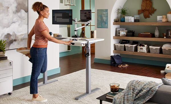 Why should I use a standing desk mat with my sit-stand desk?