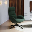 Moss green lounge chair in workplace setting